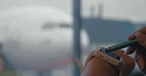 Woman using smart watch to type phone number Stock Footage 64745699