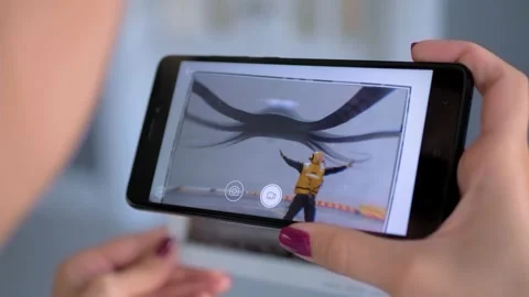 Woman using smartphone with AR application: contemporary art, surrealism concept Stock Footage 144004187