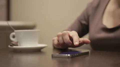 Woman using smartphone in the cafe Stock-Footage 48999405