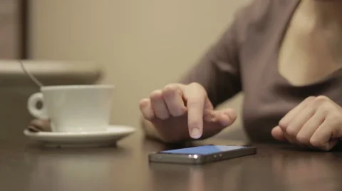 Woman using smartphone in the cafe Stock Footage 48999508