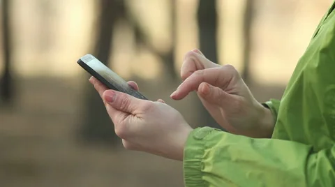 Woman using smartphone, chatting, close up Stock Footage 47223218