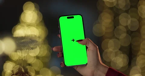 Woman using smartphone with chroma key green screen at night Stock-Footage 296756171