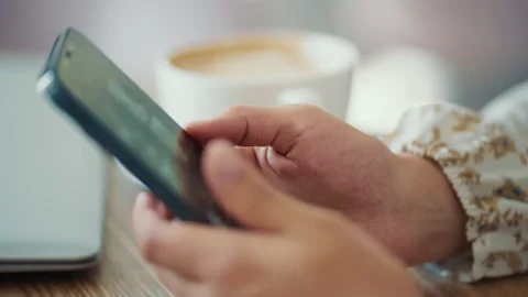 Woman using smartphone close up Video stock 259048498