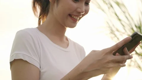 Woman using smartphone for direction and looking on location map. Stock Footage 101597763