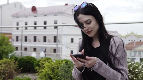 Woman is using smartphone Stock Footage 77752216