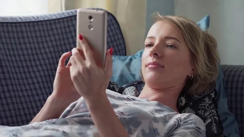 Woman using smartphone Stock Footage 81524740