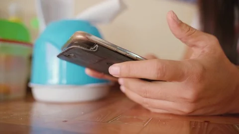 Woman using a smartphone Video stock 99325671