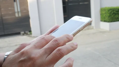 Woman using smartphone Видео 103997976