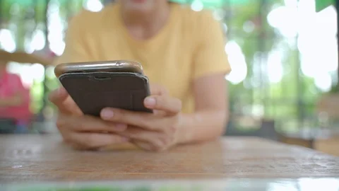 Woman using a smartphone Stock Footage 117325001