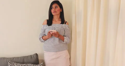 Woman using smartphone. Video stock 264807890