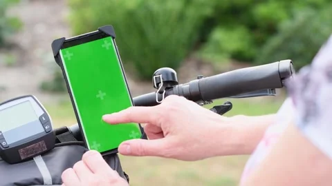 Woman using smartphone with green screen mocku navigate maps app Stock Footage 270154948