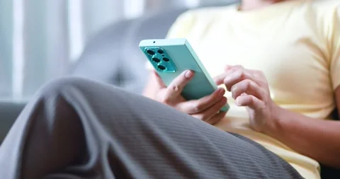 Woman using a smartphone at home, Mobile banking, Online shopping, Digital .. Stock Footage 339287538