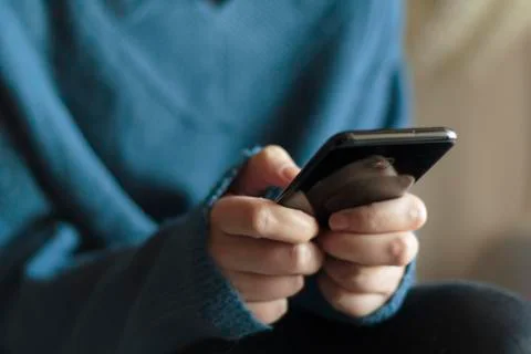 Woman using smartphone Stock Photos