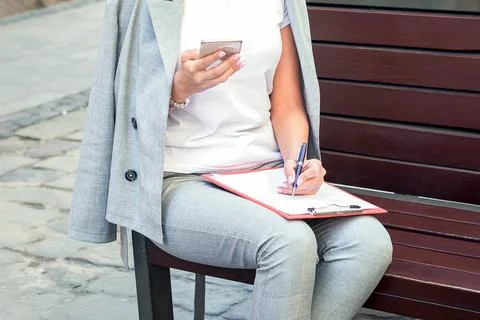 Woman using smartphone. Stock Photos