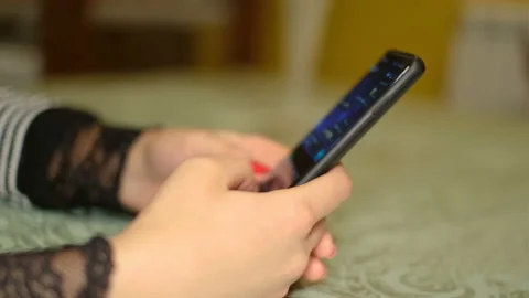 Woman using smartphone for text messaging chat on a smartphone,social network Stock Footage 146099054