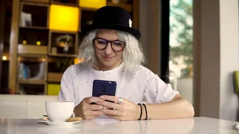 Woman using smartphone, texting on mobile phone Video stock 82966413