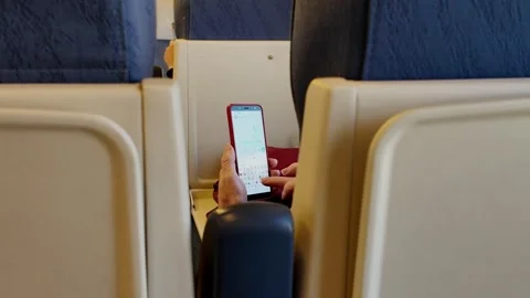 Woman Using Smartphone on Train in Spain Stock Footage 296594432