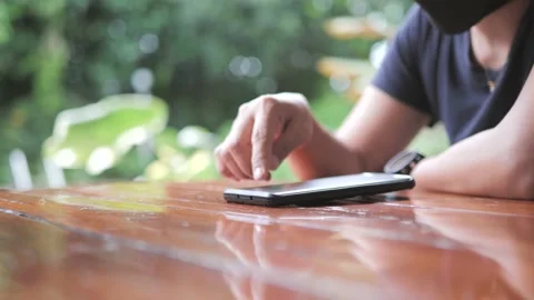 Woman using a smartphone while waiting. Stock Footage 229066509