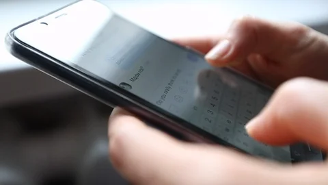 Woman using smartphone writes message text on social network. Phone screen  Stock Footage 118613877