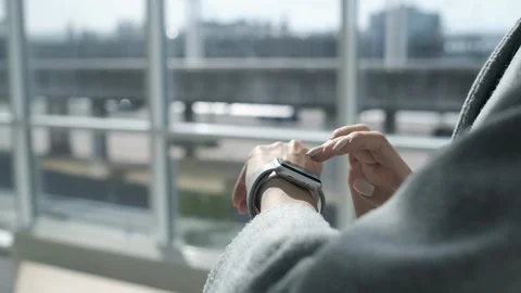 Woman using smartwatch touchscreen technology device. Video stock 116197770