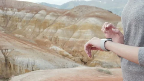 Woman using smartwatch touchscreen wearable technology device Stock Footage 92379232