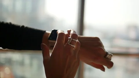 Woman using smartwatch touchscreen wearable technology device. Closeup. Smart Stock Footage 103107940