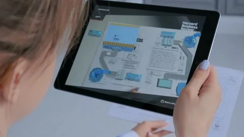 Woman using tablet with augmented reality app - AR robotized production module Stock Footage 144005193