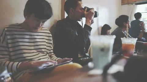 Woman using tablet in cafe Stock Footage 58465143