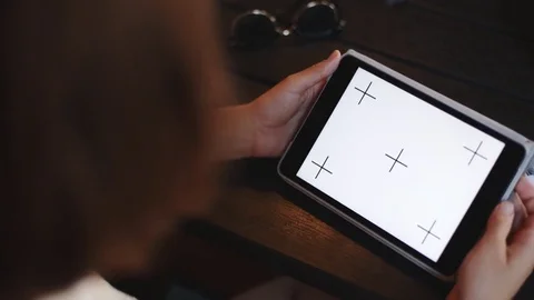 Woman using tablet in cafe Stock Footage 77563863