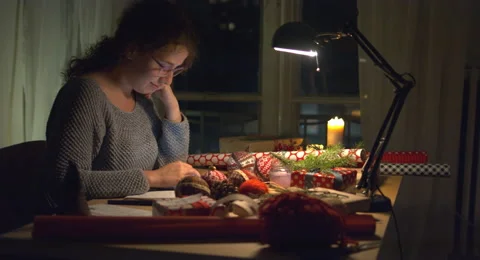 Woman Using a Tablet in a Christmas Setting Stock Footage 61157465
