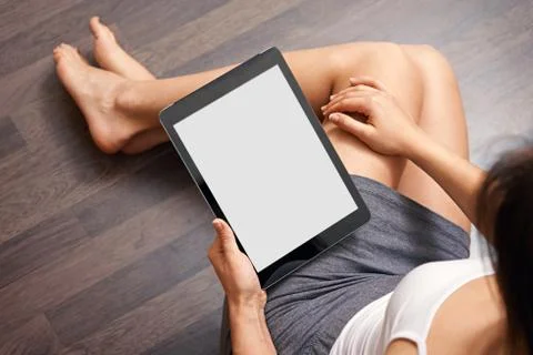 Woman using tablet computer Foto stock