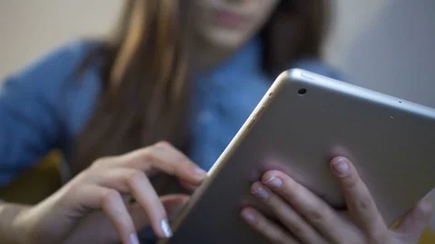 Woman using tablet computer touchscreen in cafe. Close-up Stock Footage 71492915