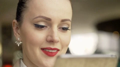 Woman using tablet computer touchscreen in cafe 1920x1080 스톡 동영상 73417934