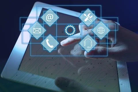 Woman using tablet on dark background, closeup. Technical support 写真素材