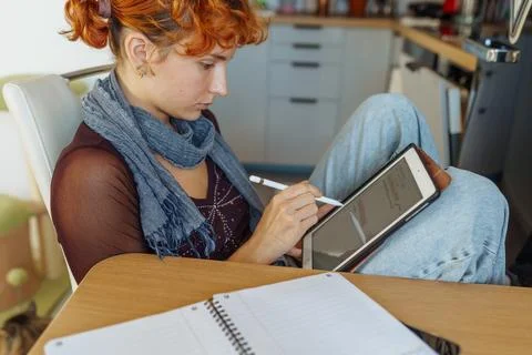 Woman using tablet, e-learning Stock Photos
