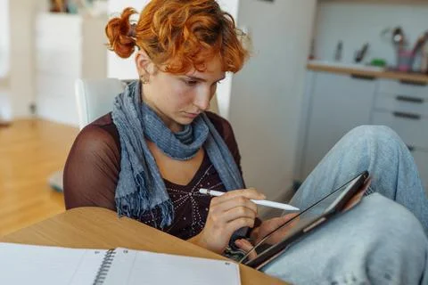 Woman using tablet, e-learning Stock Photos