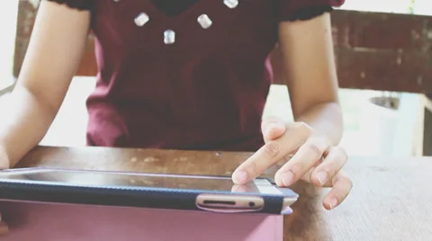 Woman using a tablet Stock Footage 35752957