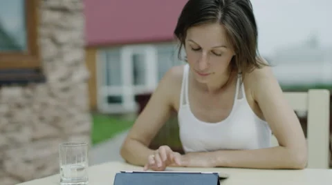 Woman using tablet Stock Footage 66061101
