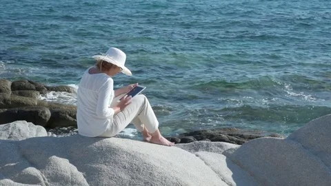 Woman using tablet Stock Footage 74969074