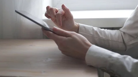 Woman using tablet at home Video stock 70644359