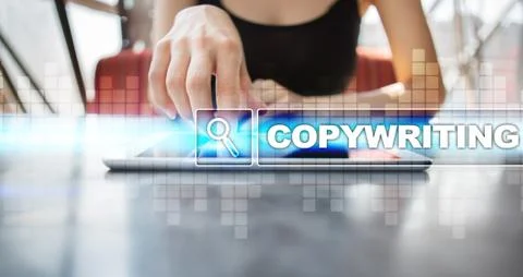 Woman using tablet pc and selecting copywriting. 스톡 사진