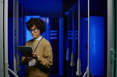 Woman using tablet pc in data center 스톡 사진