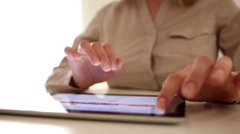 Woman using tablet pc at home, surfing on internet Stock Footage 43655433
