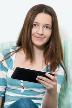 Woman using a tablet pc Foto stock