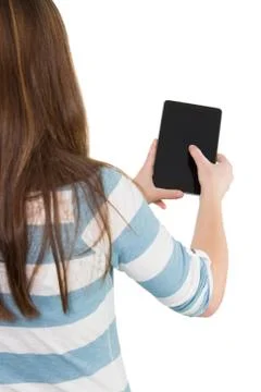 Woman using a tablet pc Foto stock