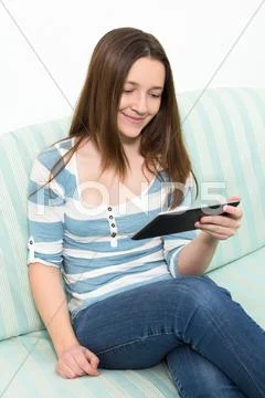 Woman using a tablet pc Stock Photos