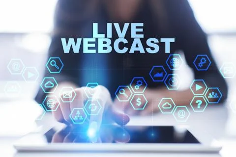 Woman is using tablet pc, pressing on virtual screen and selecting live webcast Фото