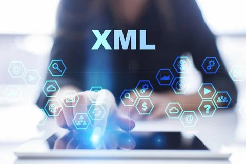 Woman is using tablet pc, pressing on virtual screen and selecting xml Foto stock