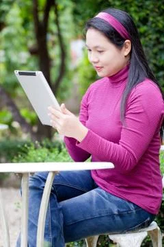 Woman using tablet Stock Photos