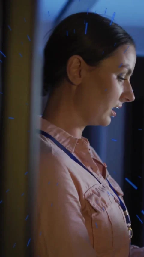 Woman using tablet in server room with digital data animation overlay Stock Footage 344285223